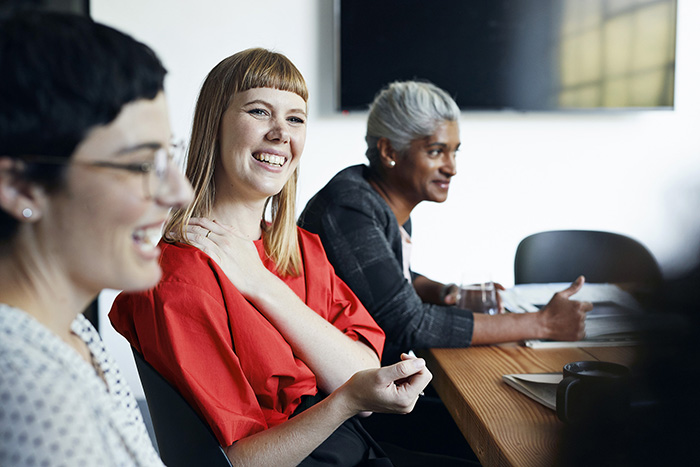 Happy women in meeting