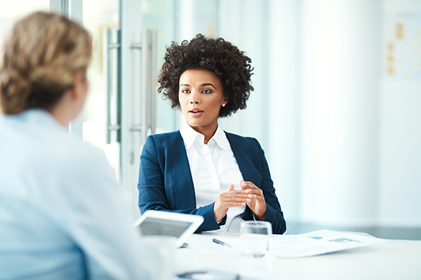 A legal professional talking to a client.